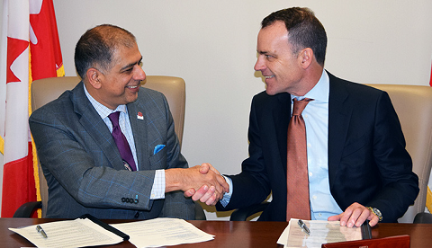 Chief Statistician Anil Arora and Evan Siddall, President and CEO of Canada Mortgage and Housing Corporation, sign an historical agreement to improve housing data in Canada. Chief Statistician Anil Arora and Evan Siddall, President and CEO of Canada Mortgage and Housing Corporation, sign an historical agreement to improve housing data in Canada.